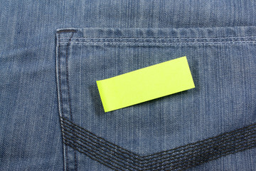 green note paper on jean pocket