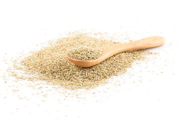 Dried rosemary leaves in wooden spoon