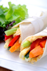 Healthy bite size wraps with carrot, capsicum and a side salad