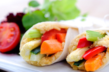 Healthy bite size wraps with carrot, capsicum and a side salad