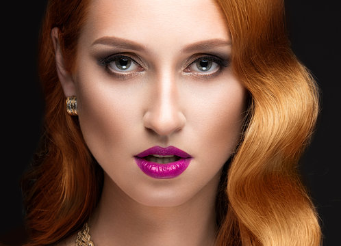 Beautiful red hair woman with evening make-up, pink lips and