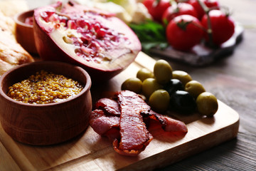 Ingredients of Mediterranean cuisine, on wooden board background