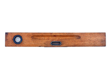 Old wooden spirit level on a white background