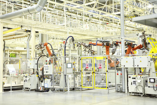 Part of the welding in a large automobile factory