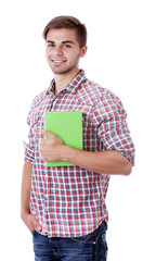 Young man with book on white background