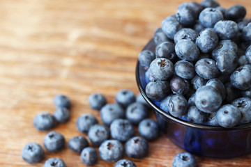 blueberries on wood background