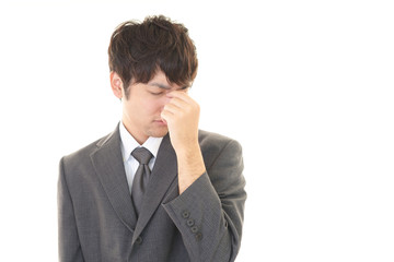 疲れた様子のビジネスマン