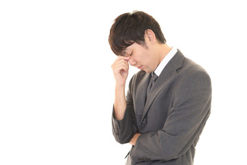 疲れた様子のビジネスマン