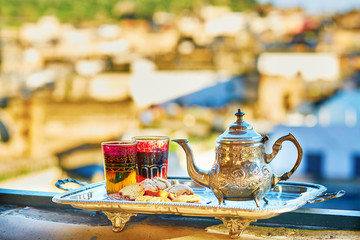 Moroccan mint tea with sweets - obrazy, fototapety, plakaty