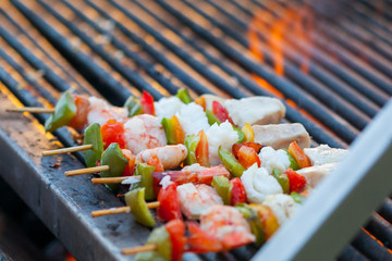 grilled barbecued mixed seafood in BBQ Flames.