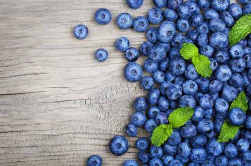 Blueberry on old wooden background