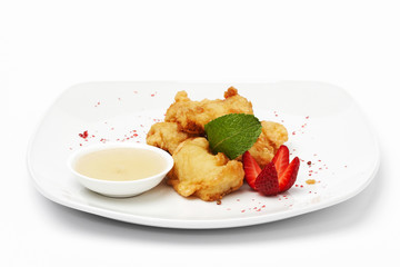 Chicken food with sauce on white plate