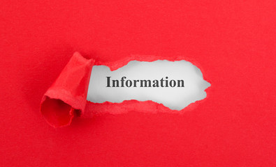 Text appearing behind torn red envelop