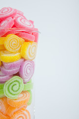 Jelly sweet, flavor fruit, candy dessert colorful in glass on wh