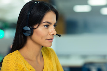 Beautiful businesswoman with headphones