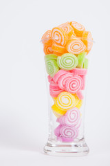Jelly sweet, flavor fruit, candy dessert colorful in glass on wh