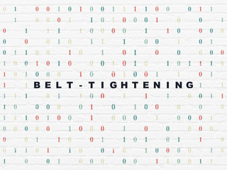Finance concept: Belt-tightening on wall background