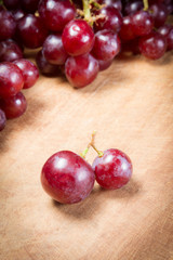 Red Grapes on a wooden table