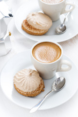 cup of espresso and cakes for breakfast, top view