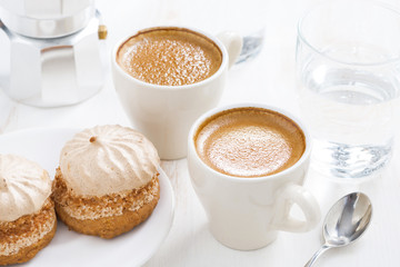 cup of fresh espresso and cakes for breakfast, horizontal
