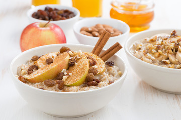 oatmeal with fresh apples, raisins and cinnamon for breakfast 