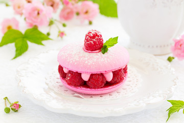 French makarons cake with raspberries.