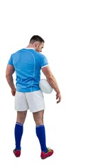 Rugby player standing with ball