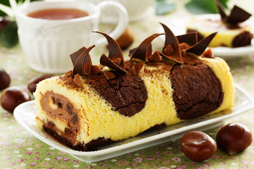 Sponge roll with chocolate and chestnut cream.