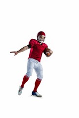 American football player protecting football