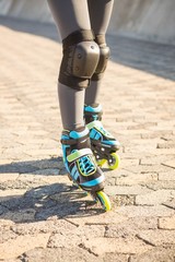 Close up view of woman wearing inline skates