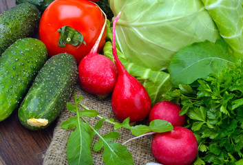 Composition with raw vegetables on sacking