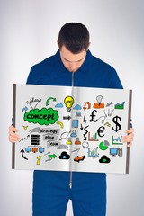 Composite image of manual worker showing a book