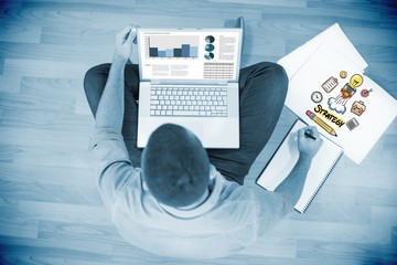 Composite image of business interface with graphs and data