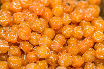 Heap of dried honey Chinese plum (Prunus mume) for retail sale