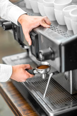 Putting holder to the coffee machine