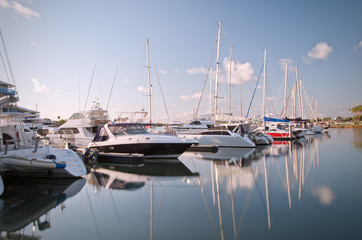 Fototapeta premium Mooring yachts with reflection