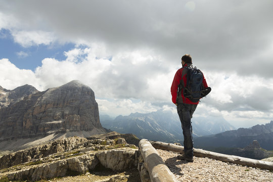 Man hiking in Dolomite Mountains