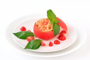 Cold spaghetti in tomato cup