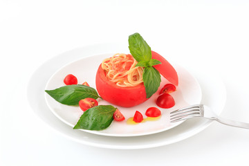 Cold spaghetti in tomato cup