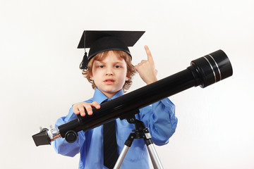Little professor in academic hat with old telescope on a white background