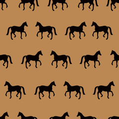 Vector seamless pattern with black horses silhouettes