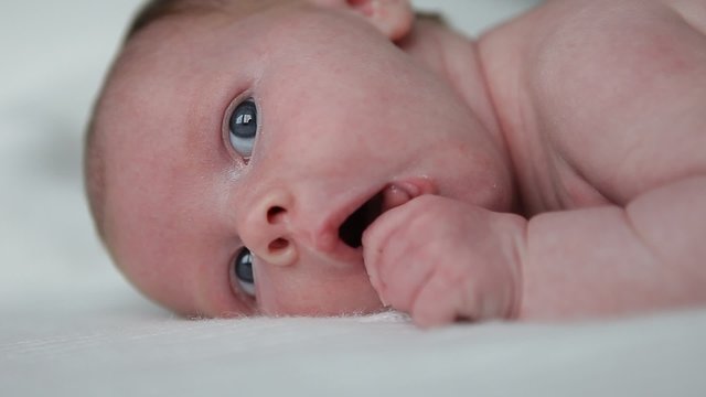 little newborn baby on a blanket