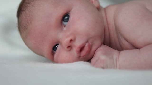 little newborn baby on a blanket