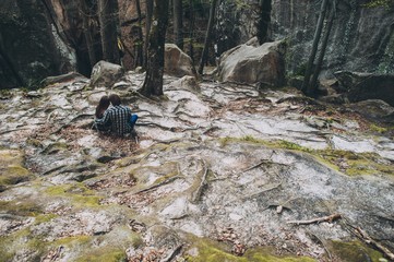 couple in love, walk on the rocks Dovbush Carpathian Mountains