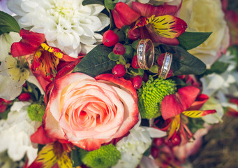 bridal bouquet and rings
