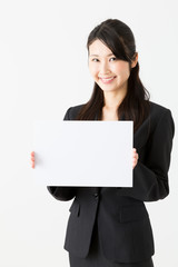 Fototapeta premium asian businesswoman holding blank whiteboared on white background