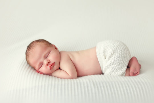 sleeping newborn baby