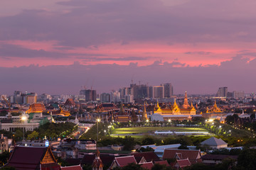 Fototapeta na wymiar Wat Phra Kaew, Temple of the Emerald Buddha and Grand Palace at twilight in Bangkok, Thailand