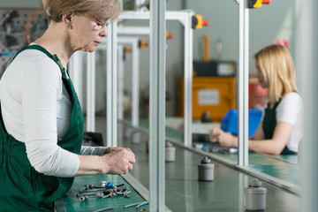 Elderly woman at work