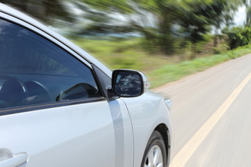 Fototapeta na wymiar speeding car with motion blur